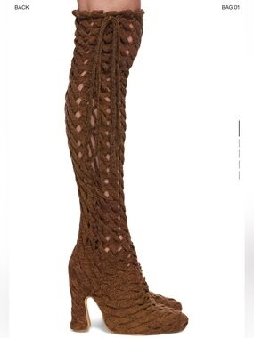Isa Boulder Ssense exclusive brown spiralcable tall boots.